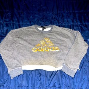 Gray and gold cropped adidas crewneck sweatshirt
